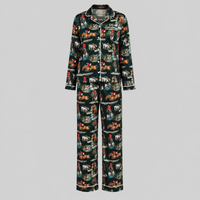 The Hunt women’s satin pyjama set with horse and hound print, white piping and full-length trousers.